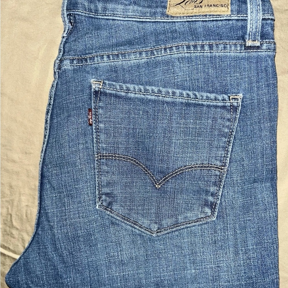 EUC WOMENS REDTAB SAN FRANCISCO LEVI’S DEMI CURVE MED WASH CAPRI JEANS SZ 10/30